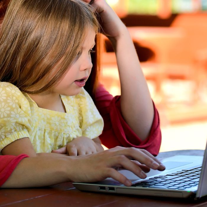 image of a kid on a laptop