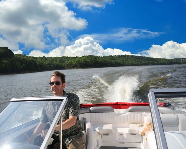 Man driving a boat