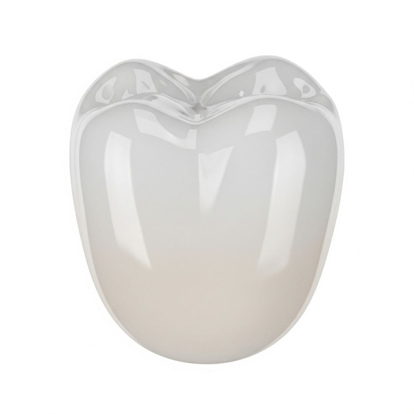 A precisely crafted ceramic dental crown made with digital technology. A precisely crafted ceramic dental crown made with digital technology.