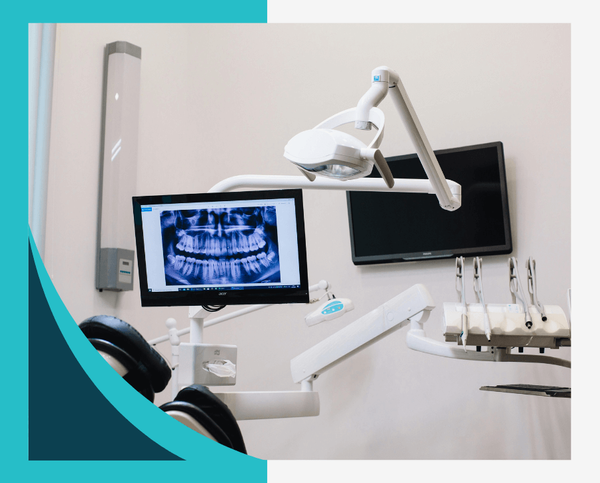 dentist office showing dental x-ray on screen