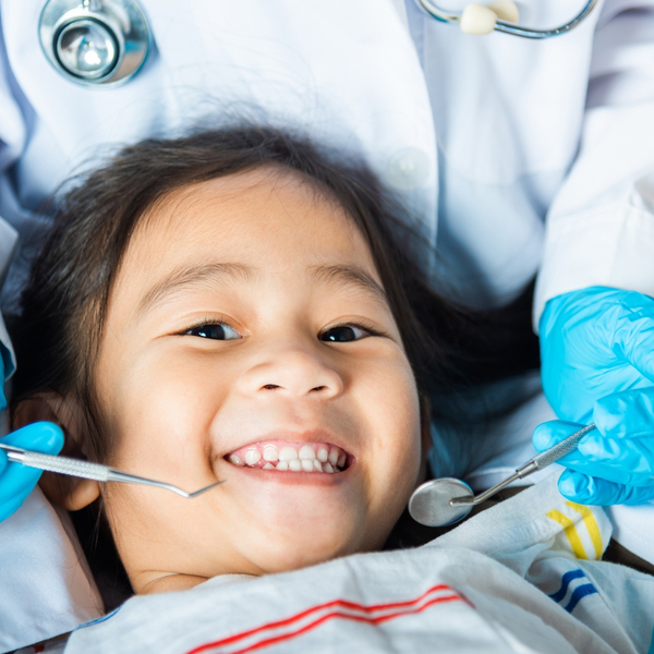 image of a child getting a dental exam