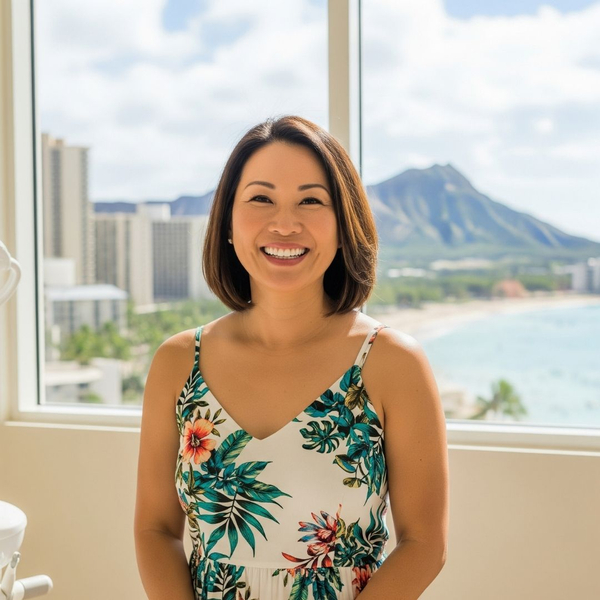 A confident patient in Honolulu, happy with their dental care results. A confident patient in Honolulu, happy with their dental care results.