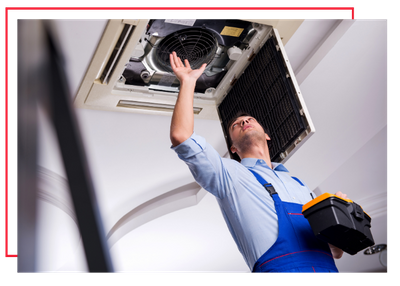 HVAC technician inspecting ducts. 