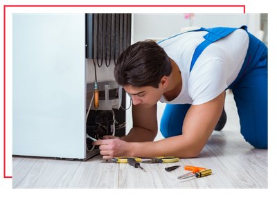 HVAC technician fixing a refrigerator. 