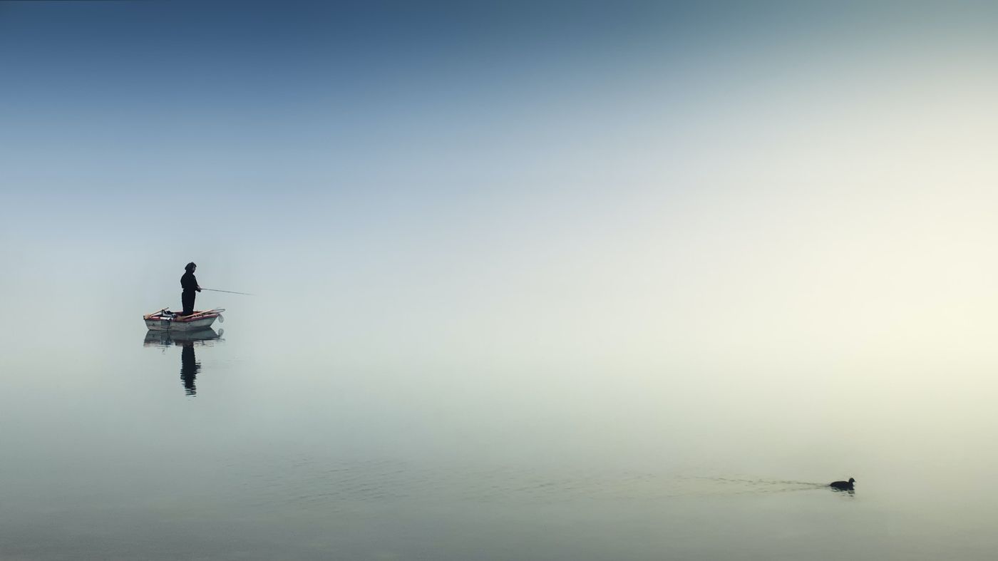 ManFishingAloneOpenWater.jpg