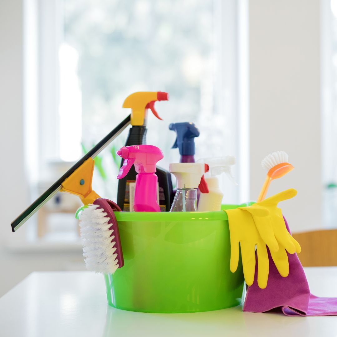 a bucket of cleaning supplies