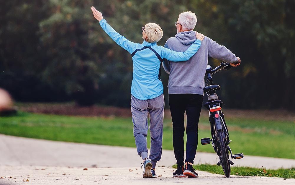 Active senior couple taking a walk