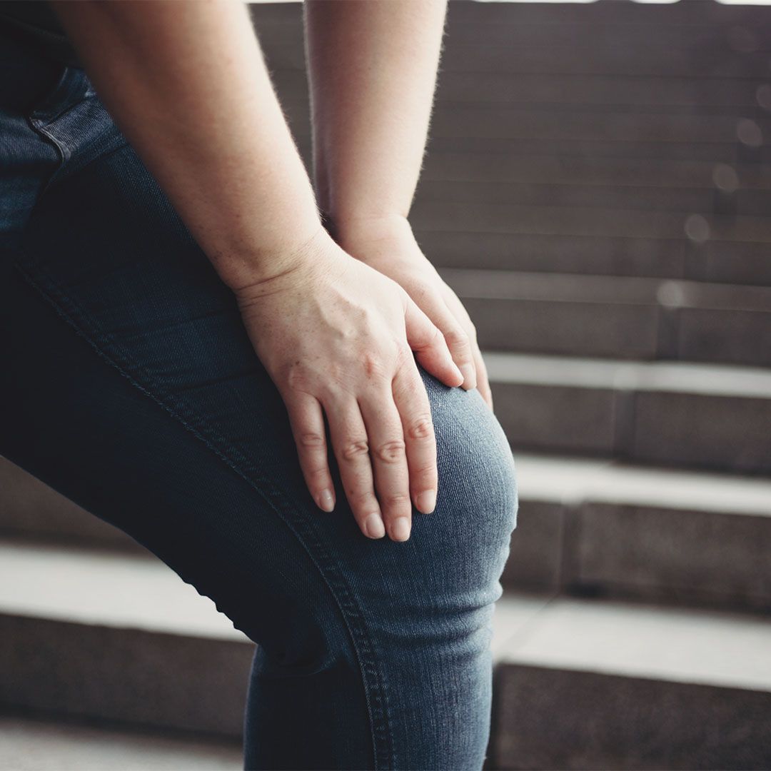 person holding their knee