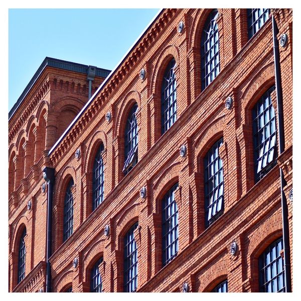 exterior of large, old brick building exterior of large, old brick building