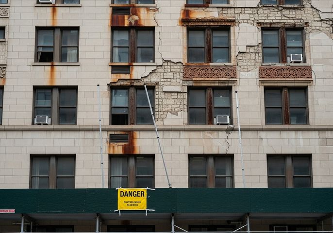 NYC building with DOB violation fines accumulating due to unsafe facade conditions NYC building with DOB violation fines accumulating due to unsafe facade conditions