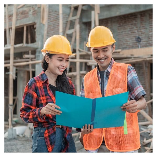 Two clients looking at construction options 6.jpg