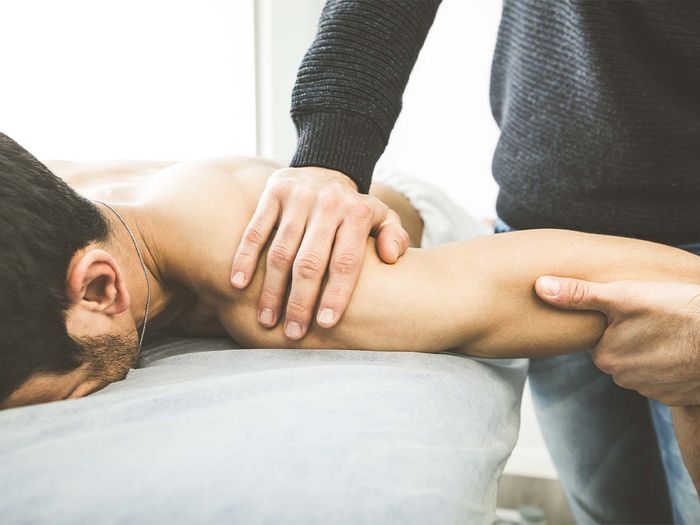 A man getting a shoulder massage