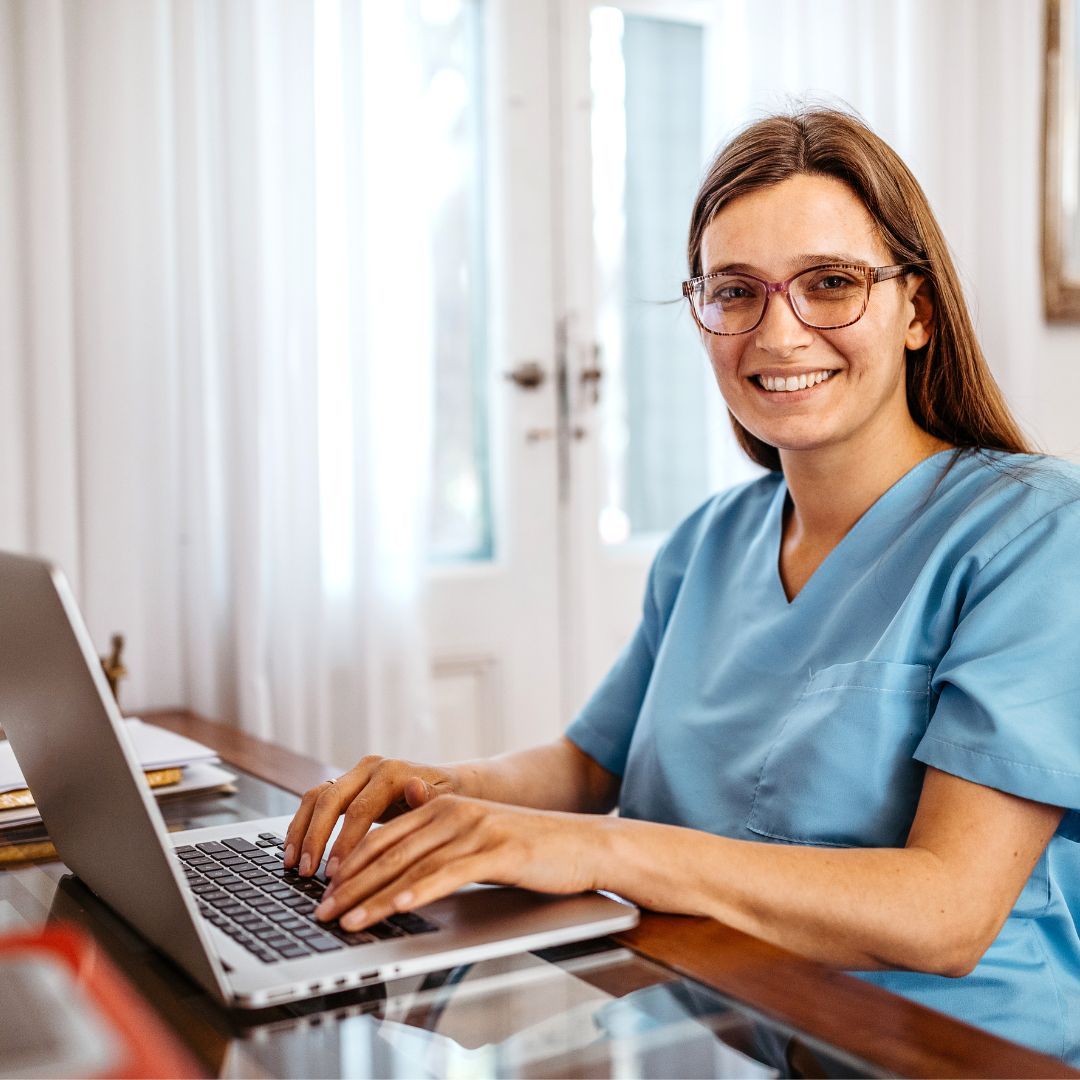 nursing student working on laptop