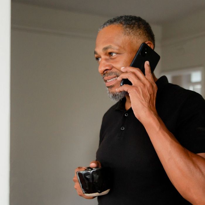 a man talking on a cell phone 4 Things To Ask Your Home Improvement Contractor (3).jpg