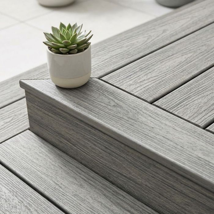 close-up of a well-maintained, smooth grey composite decking surface.