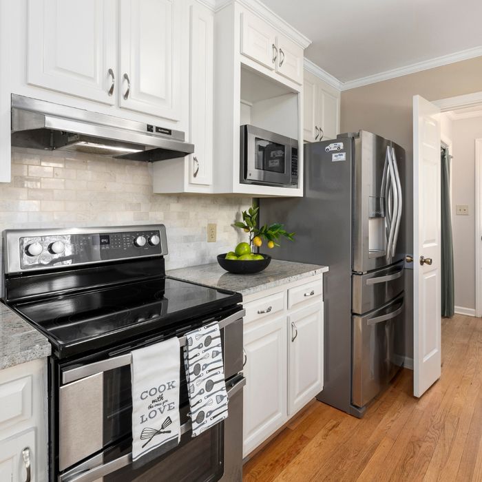 Clean kitchen with white cabinets