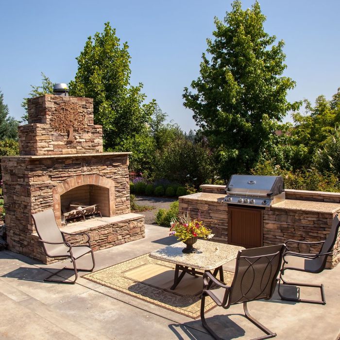 outdoor kitchen area with fireplace outdoor kitchen area with fireplace