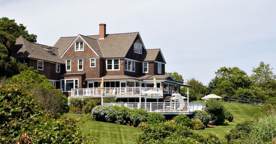 large house with multi-level deck