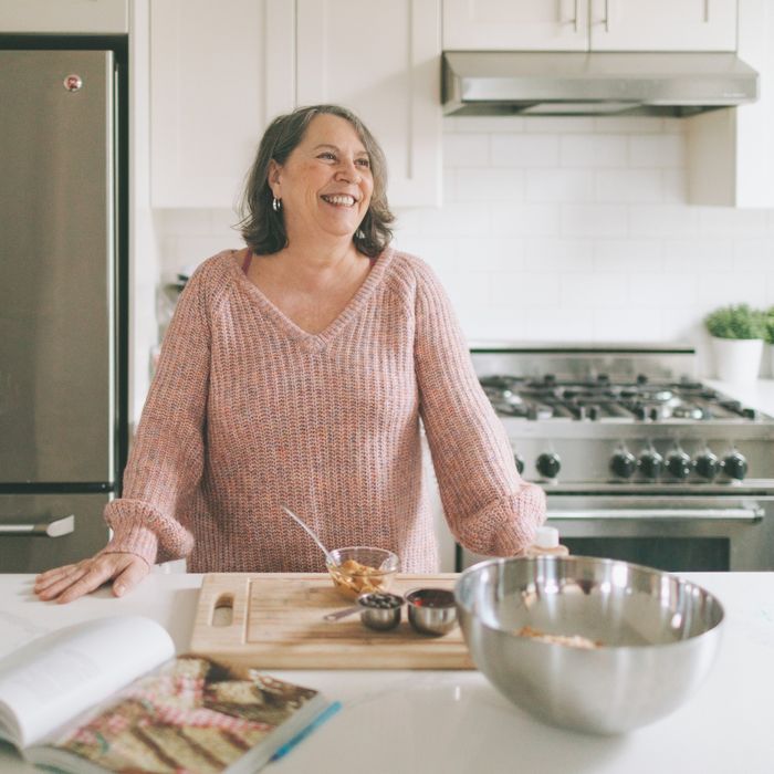 Woman behind a kitchen island