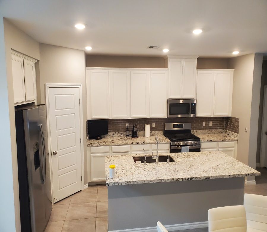 white-cabinets-with-granite-countertops.jpg