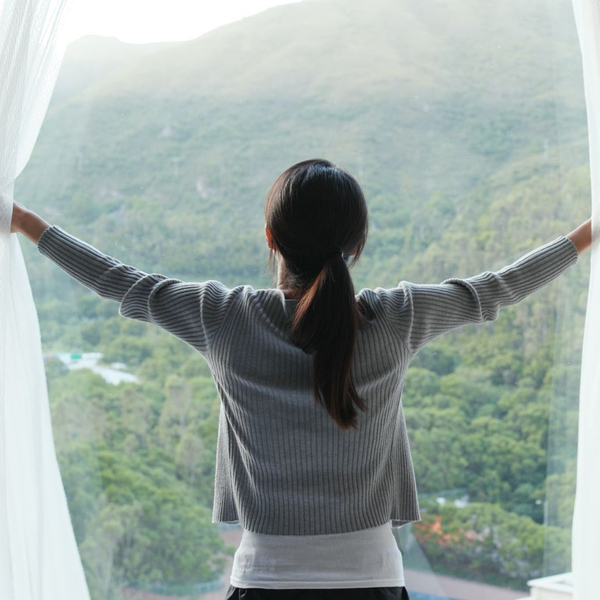 A women looking over a nature landscape