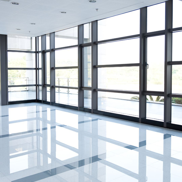 room with large windows and glass doors