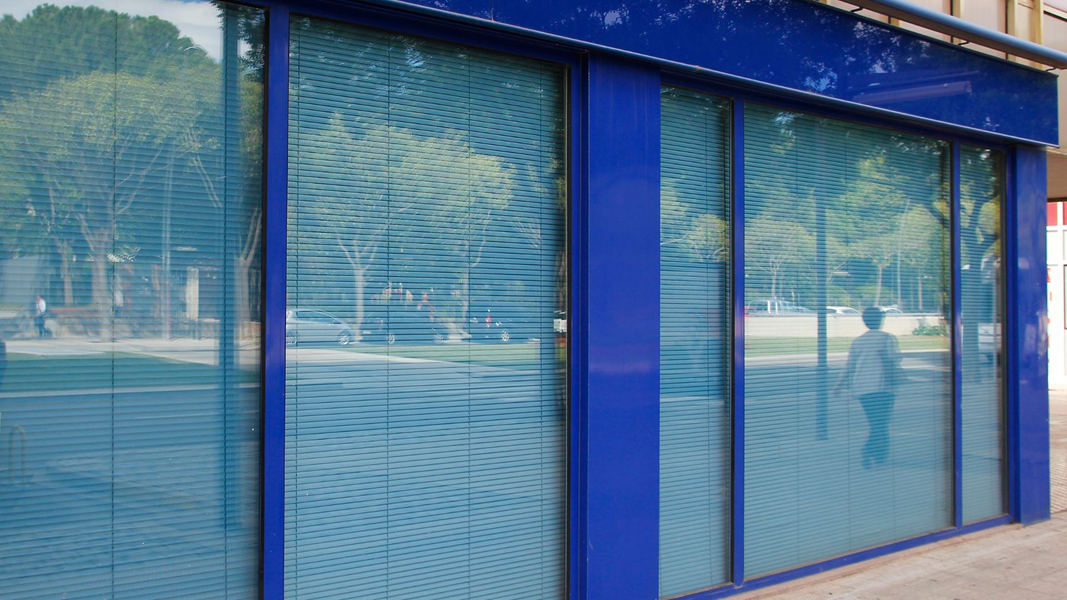 blue glass store front