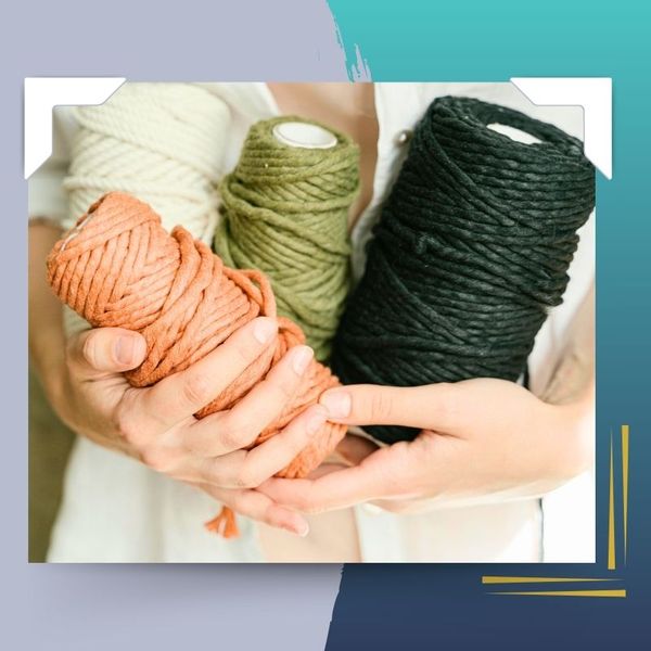 a person holding yarn Rug Tufting Extension (2).jpg