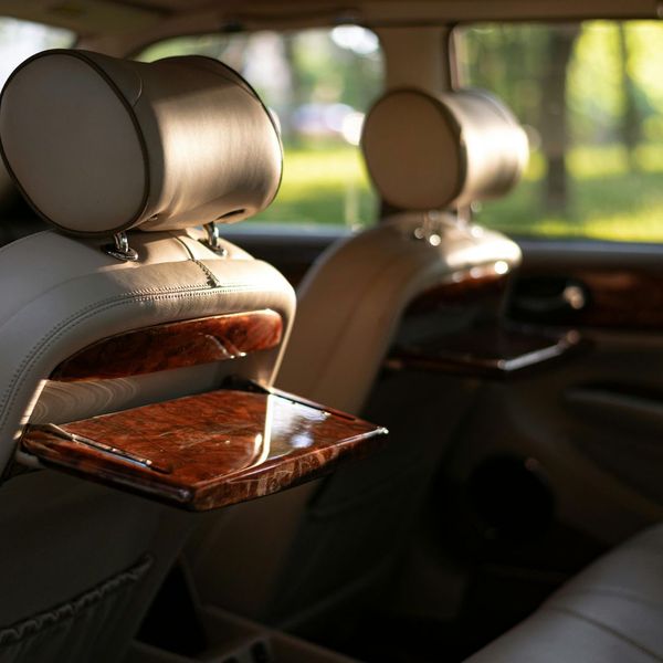 luxury car with leather upholstered seats Get Behind the Scenes with Time-Lapse Transformations on Our Channel 4.jpg