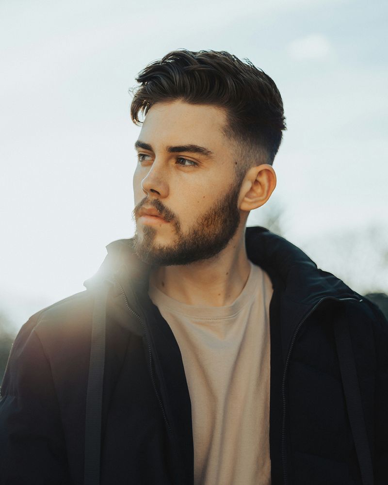 Image of well-groomed man with beard and fresh haircut Barbershop Image