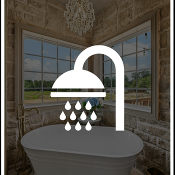 bathroom with illuminated lighting overlaid with shower head icon