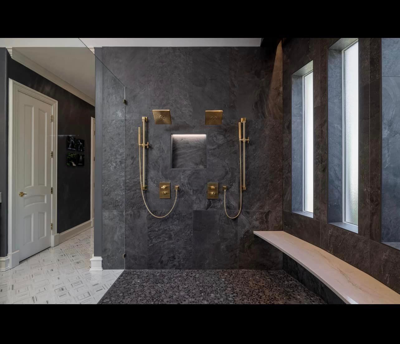 Luxurious Bathroom with Custom Illuminiche Niche and Gold Fixtures