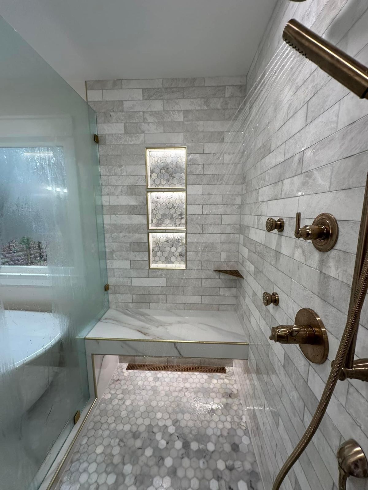 Shower with IN1349SK Trimmed with Gold Metals and LED Shelves