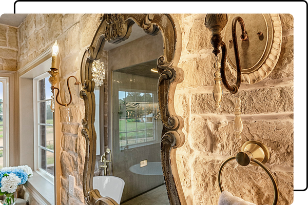ornate bathroom mirror backlit with lighting