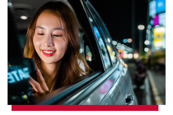 woman in car at night