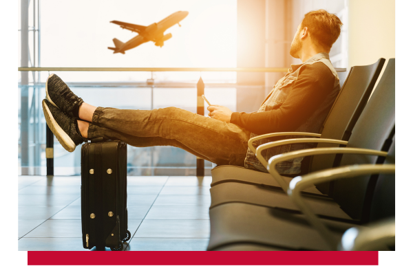 man sitting at airport