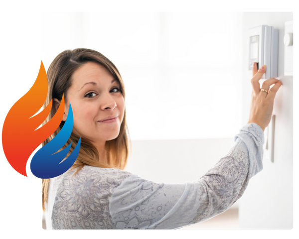 A woman changing a thermostat