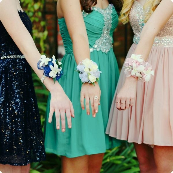 girls in prom dresses showing corsages prom dress.jpg
