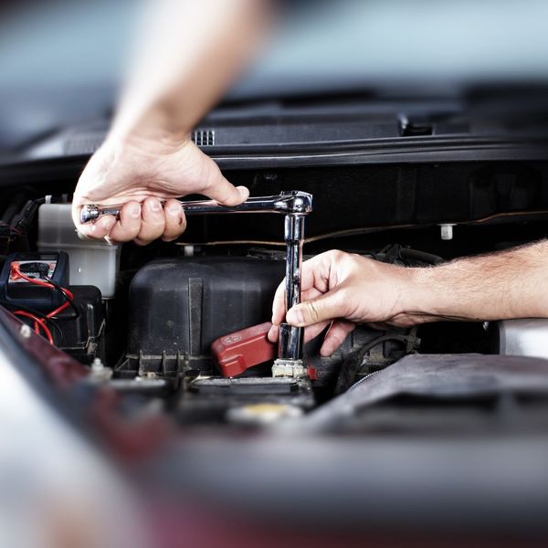 mechanic repairing car