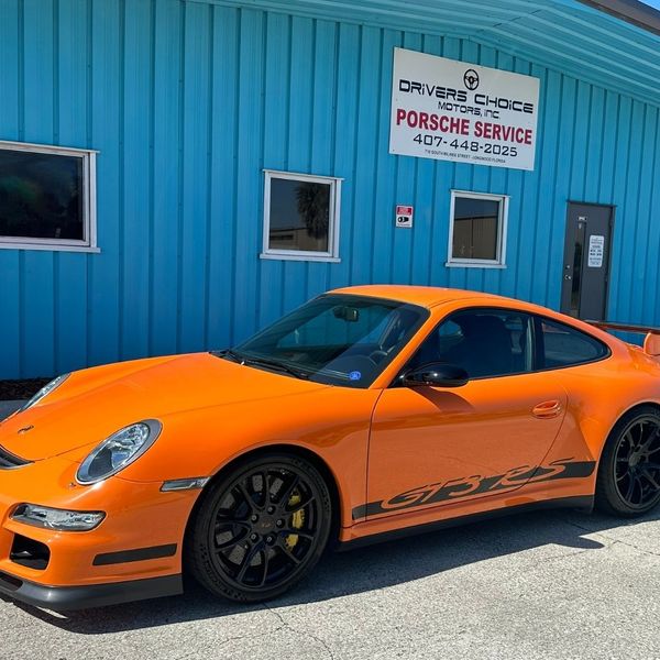 Orange Porsche outside of Driver's Choice Motors