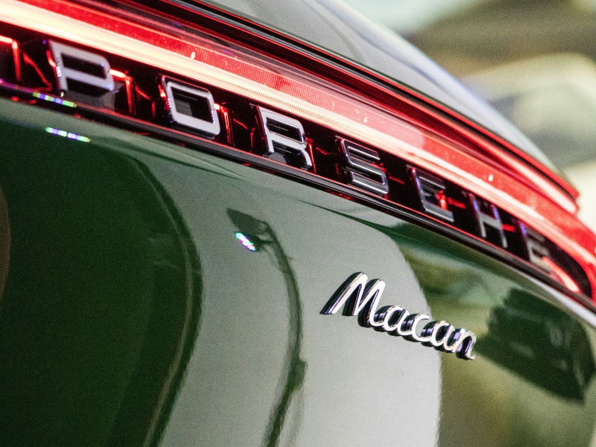 closeup of a Porsche Macan tail lights and logo closeup of a Porsche Macan tail lights and logo