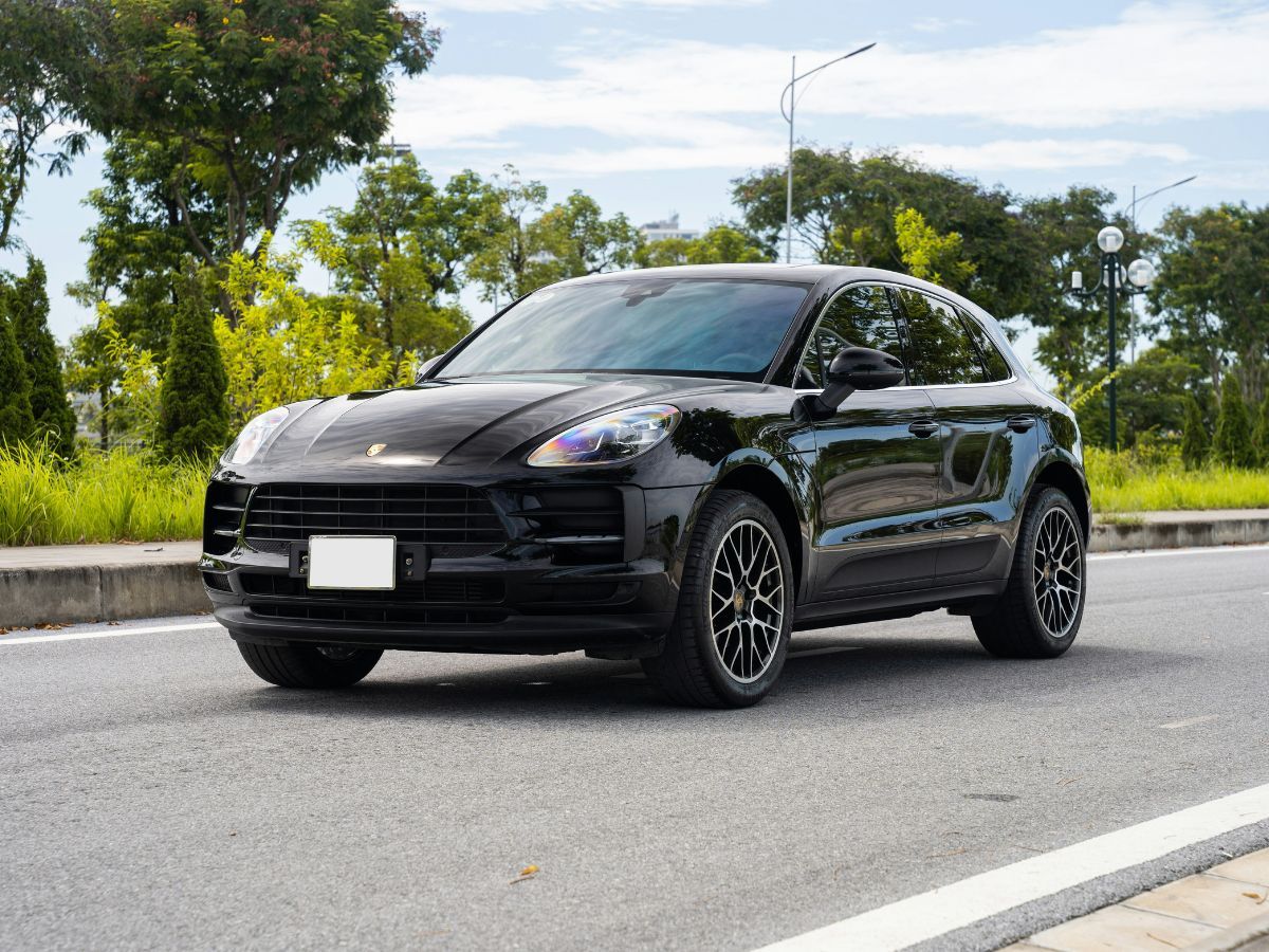 a Porsche Macan on the road