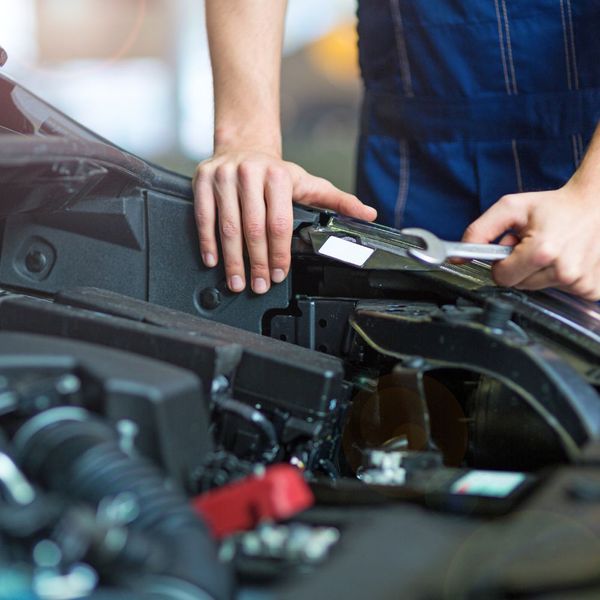 mechanic repairing car