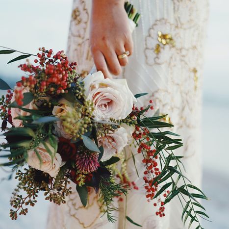 Newly married bride holding her bouquet 
