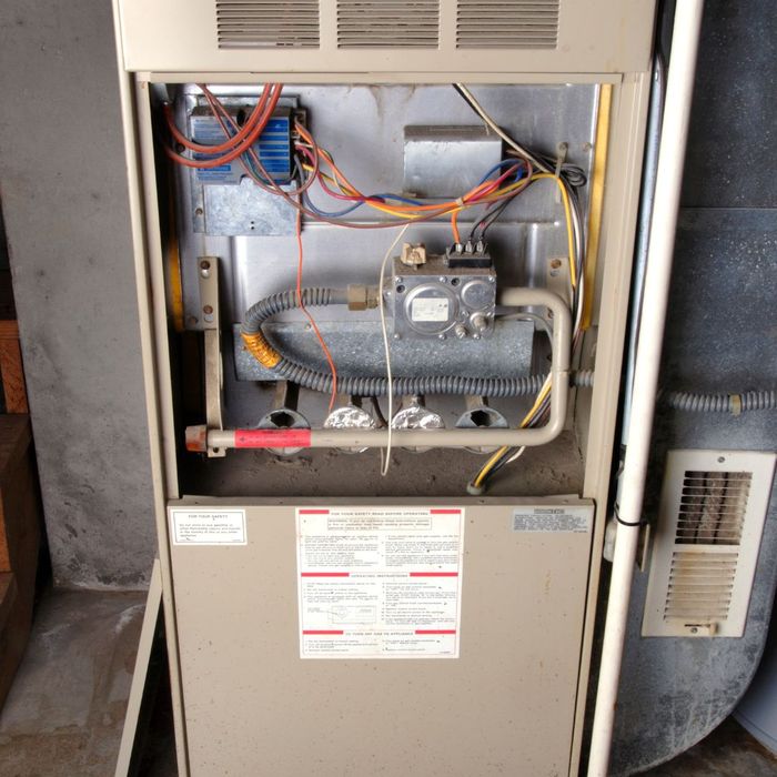 a furnace with the panel off