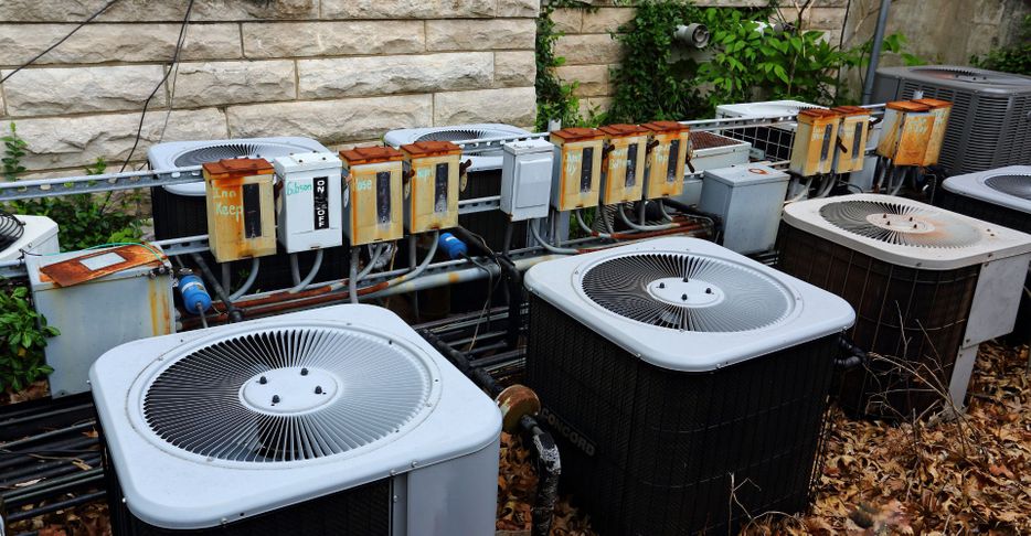 Various AC units lined up. 