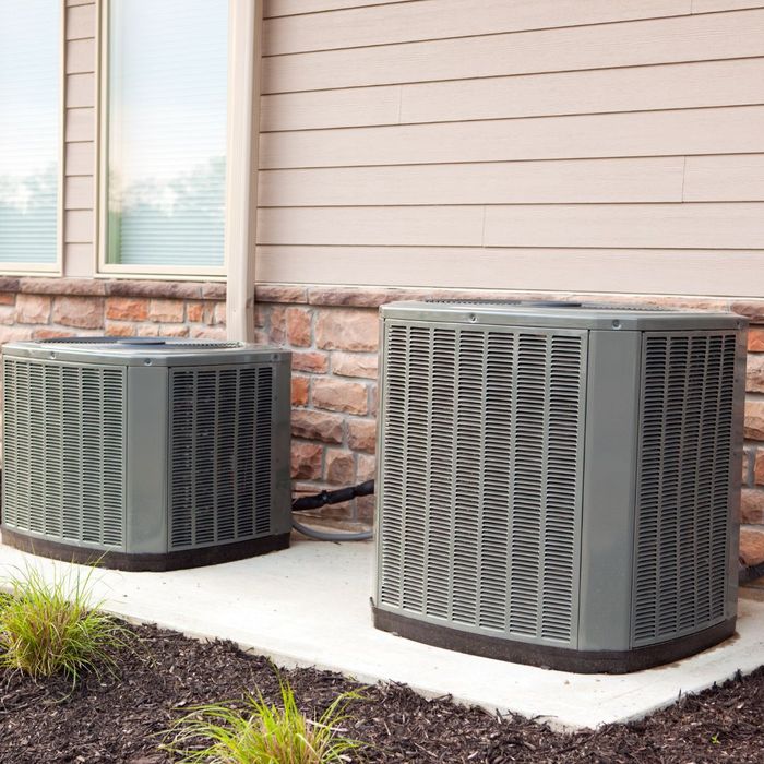 two air conditioners outside 