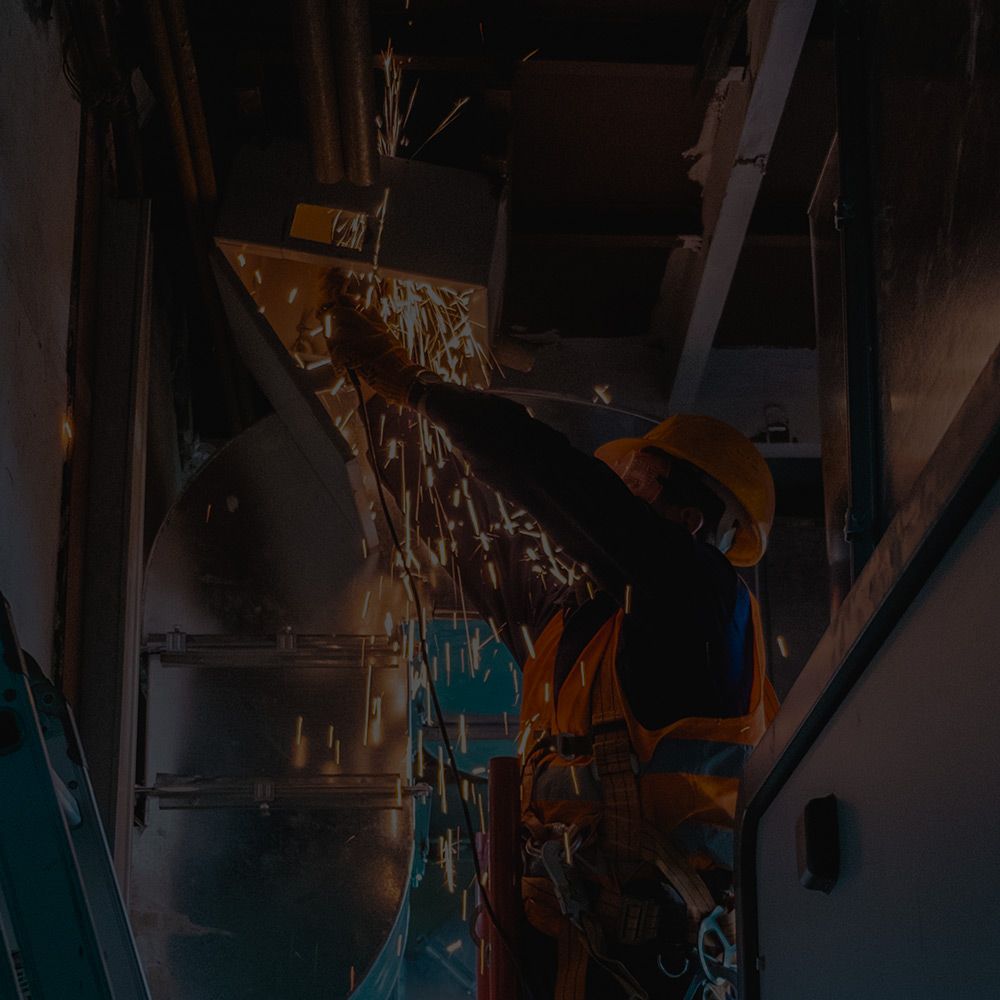 Man working on a duct 