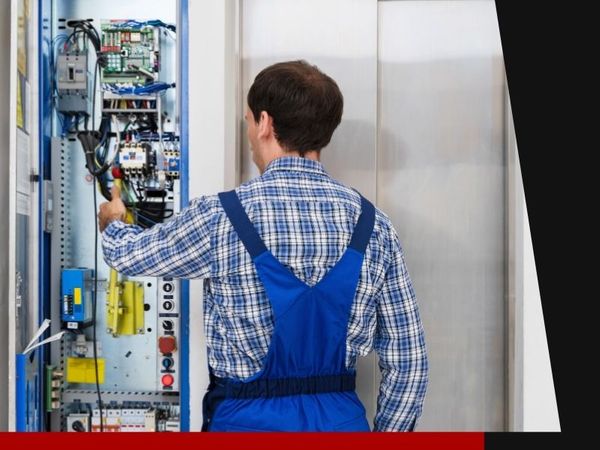 technician conducting elevator maintenance