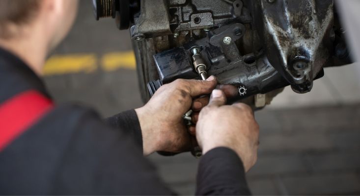 Close-up of mechanics hands